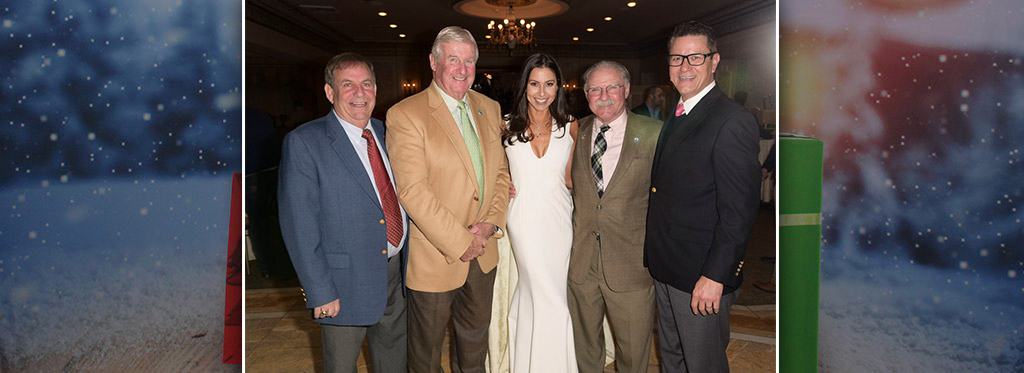 Huntington resident Christine Montanti, third from left, is joined by, from left, Tony Davida, Kevin Muldowney, Ralph Scordino and Steve Neary last week at the eighth annual Holiday Dreams event, which helped raise money to buy gifts for children of families in need. Photos/Rob Rich/SocietyAllure.com
